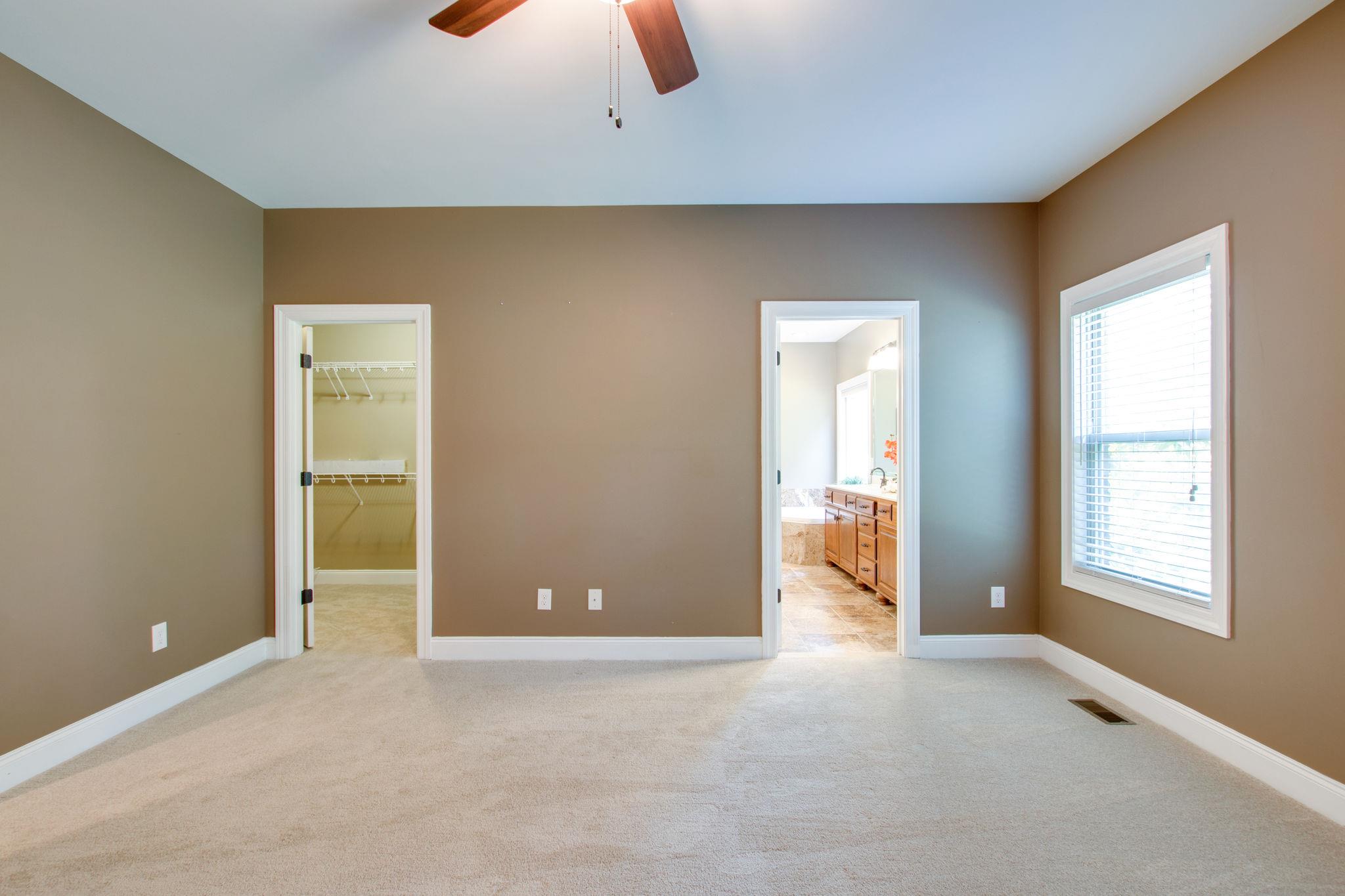 6629 Burnt Knob Road Murfreesboro, TN 37128 - Photo 10 of 27 Master bedroom is empty so the picture doesn't do it justice:) Looking toward one closet on the left and the entrance to the master bathroom.