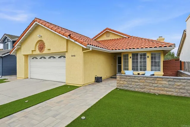 a living room with furniture and window