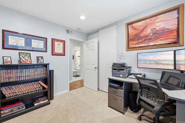 a view of a workspace with furniture and workspace