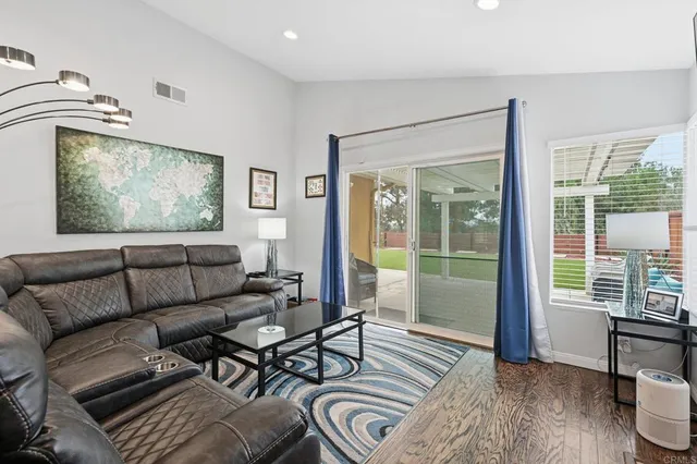 a kitchen with sink cabinets and appliances