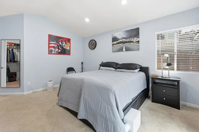 a bathroom with a double vanity sink mirror and double