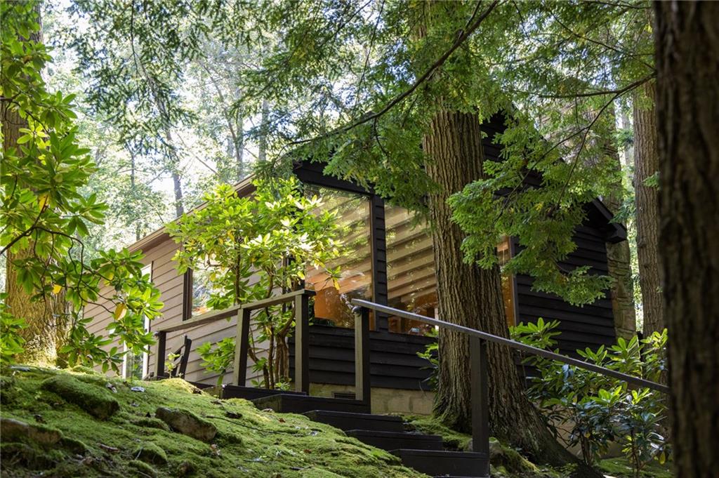 1223 Triple Creek Road Champion, PA 15622 - Photo 2 of 25 Tranquil Views from the Wall of Windows in the Living Room