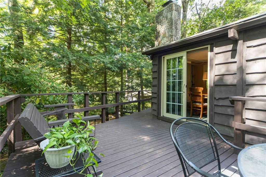 1223 Triple Creek Road Champion, PA 15622 - Photo 15 of 25 Large Wrap Around Deck off Dining Room. The Sounds of the Running Creek Below are Incredible!!!!