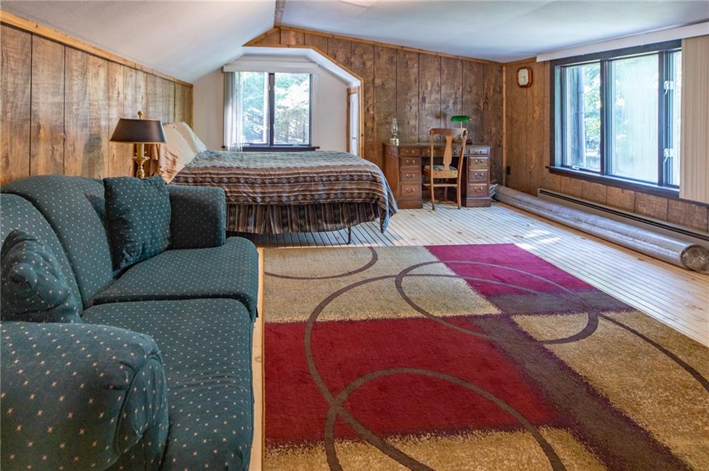 1223 Triple Creek Road Champion, PA 15622 - Photo 17 of 25 2nd Floor Bedroom Over the Garage has Hard Wood Floors. Easily Accessible Attic Storage over the Entire House