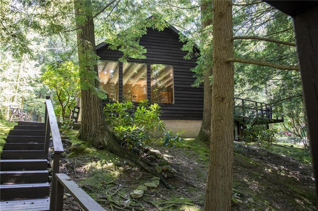 1223 Triple Creek Road Champion, PA 15622 - Photo 3 of 25 Exterior view from Private Bridge to Living Room and Large Deck