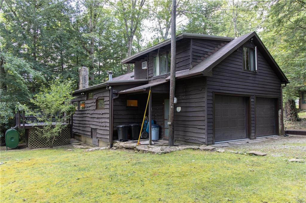 1223 Triple Creek Road Champion, PA 15622 - Photo 23 of 25 Rear View of Home-2 Car Attached Garage, Wrap Around Deck and Side Yard