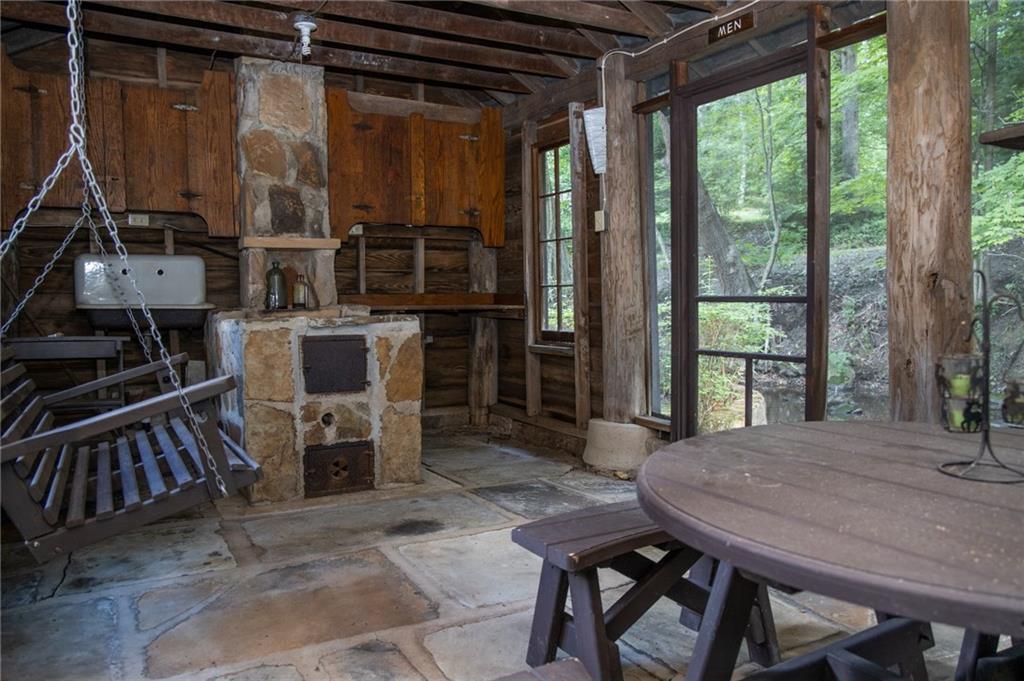 1223 Triple Creek Road Champion, PA 15622 - Photo 9 of 25 Primitive Summer Kitchen in Screened in Pavilion with Electric Right along the Creek