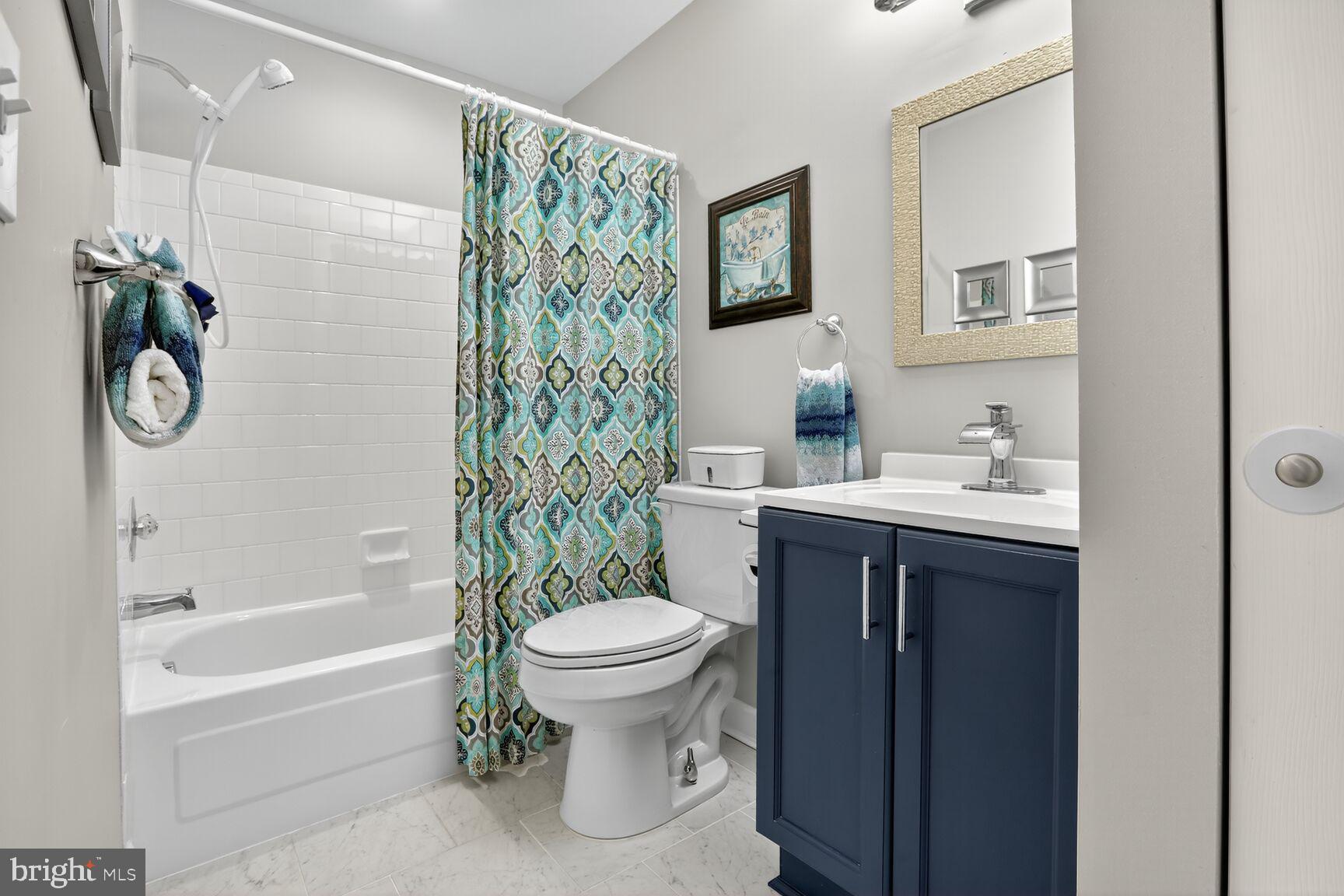 4106 Chardel Road, Unit 2G Baltimore, MD 21236 - Photo 21 of 25 a bathroom with a sink toilet and bathtub