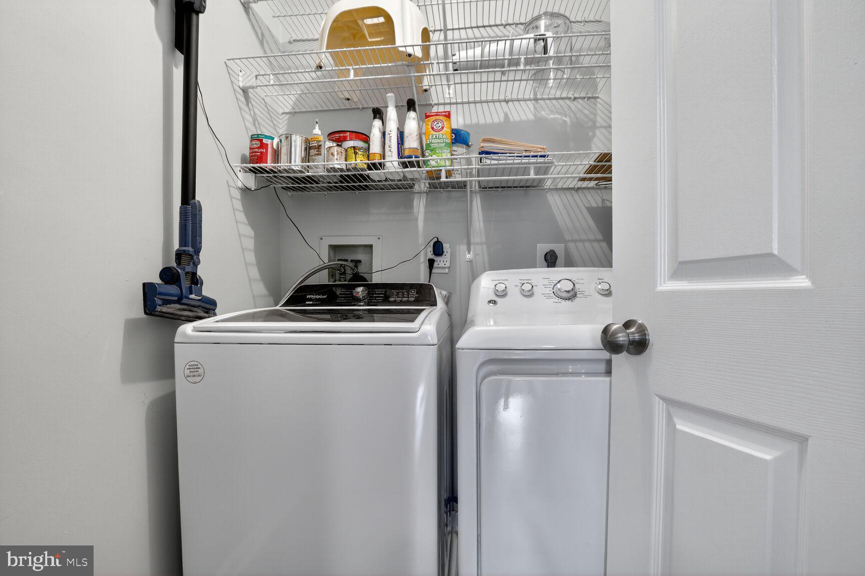 4106 Chardel Road, Unit 2G Baltimore, MD 21236 - Photo 22 of 25 a kitchen with a refrigerator and a stove