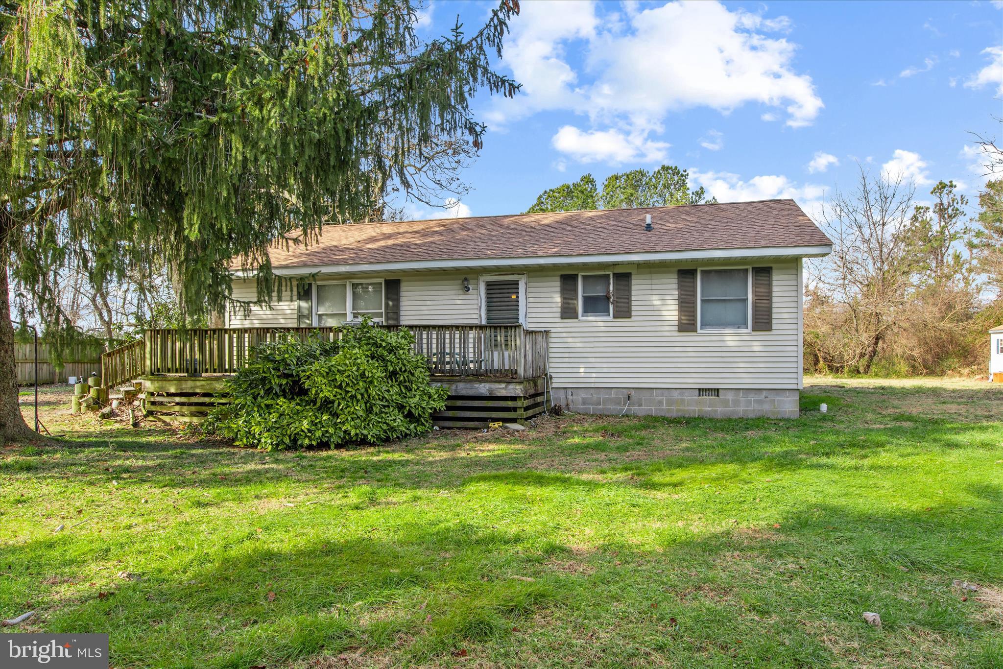 28359 Martins Farm Road Milton, DE 19968 - Photo 3 of 63 a view of a house with a backyard
