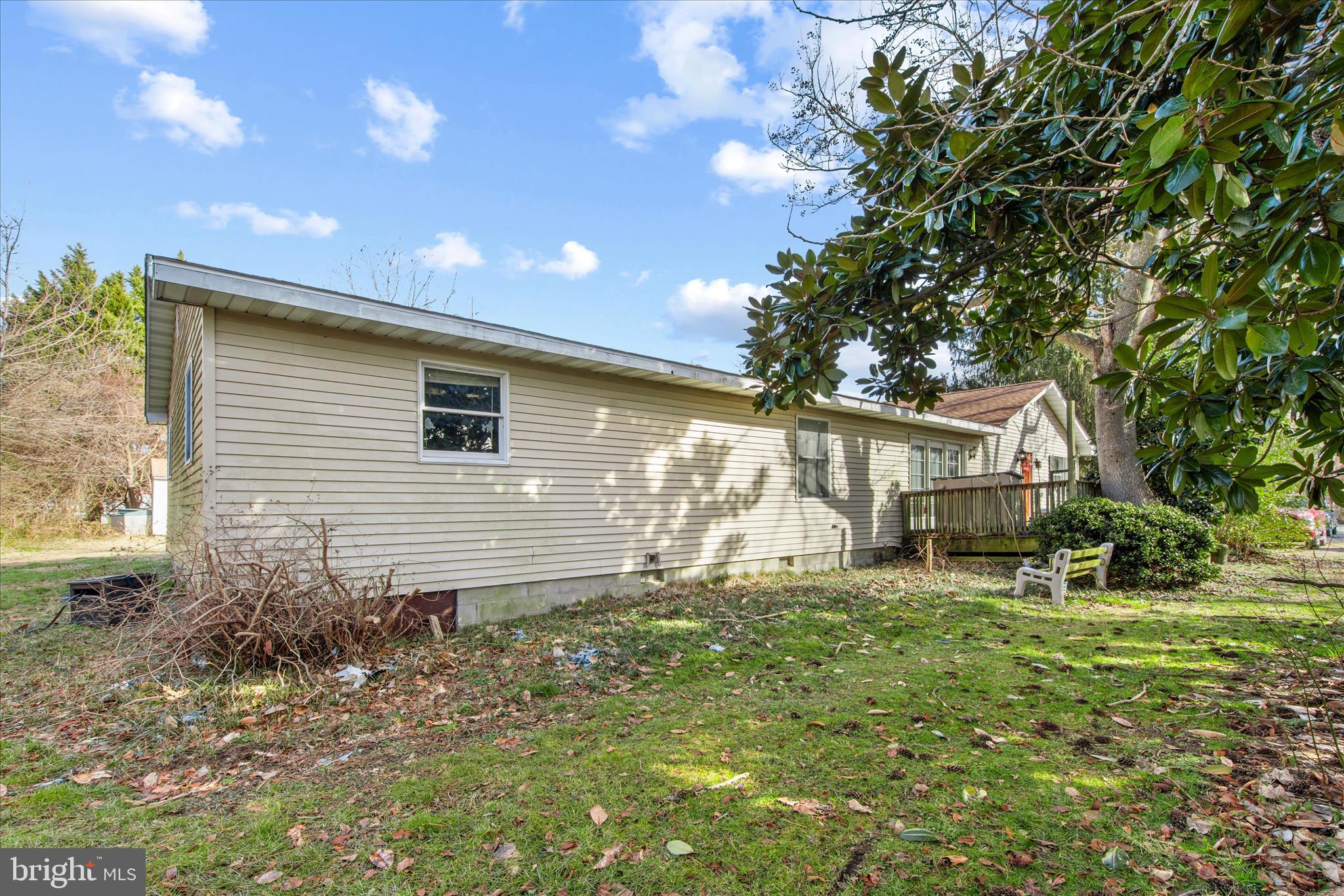 28359 Martins Farm Road Milton, DE 19968 - Photo 34 of 63 a front view of a house with garden