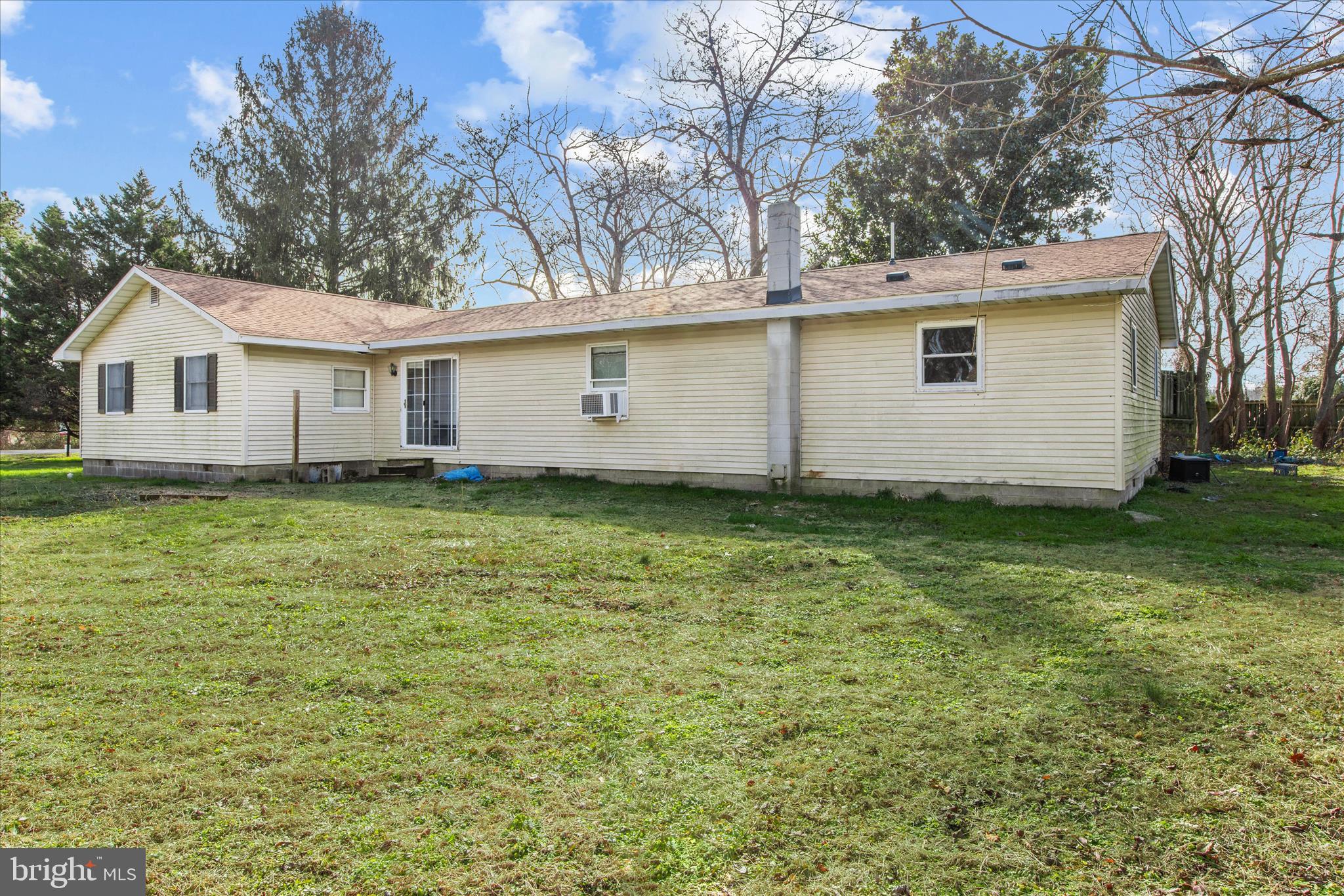 28359 Martins Farm Road Milton, DE 19968 - Photo 40 of 63 front view of a house with a yard