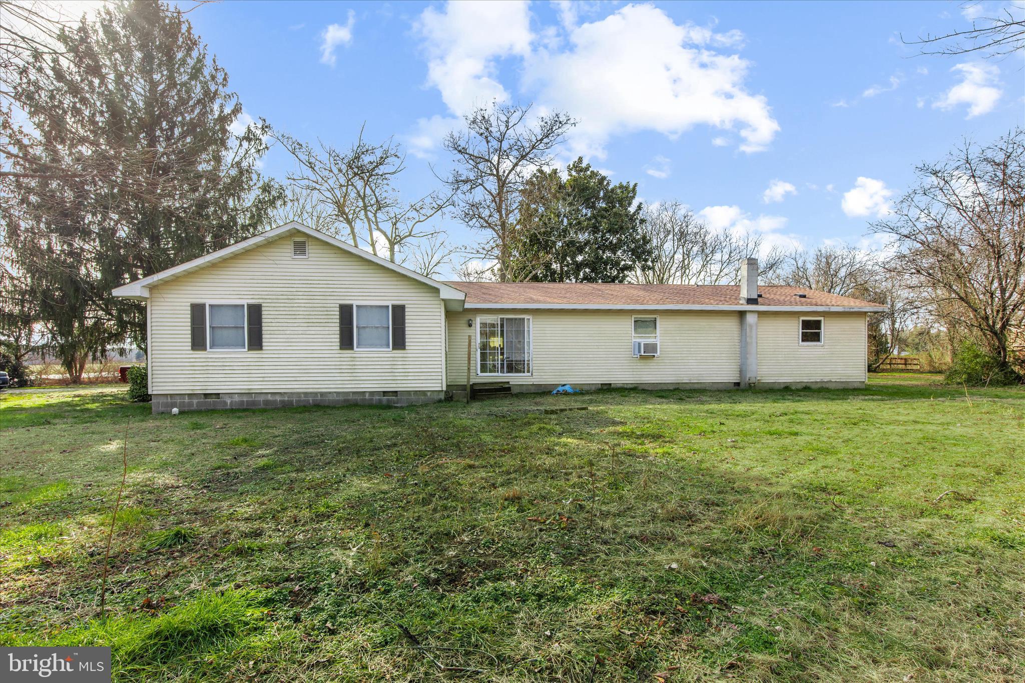 28359 Martins Farm Road Milton, DE 19968 - Photo 41 of 63 a view of a house with a yard