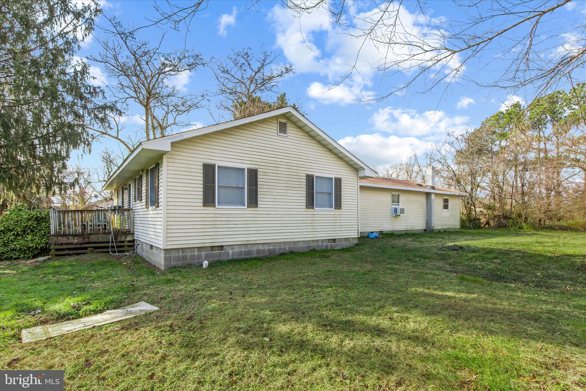 28359 Martins Farm Road Milton, DE 19968 - Photo 42 of 63 a view of a backyard with a garden