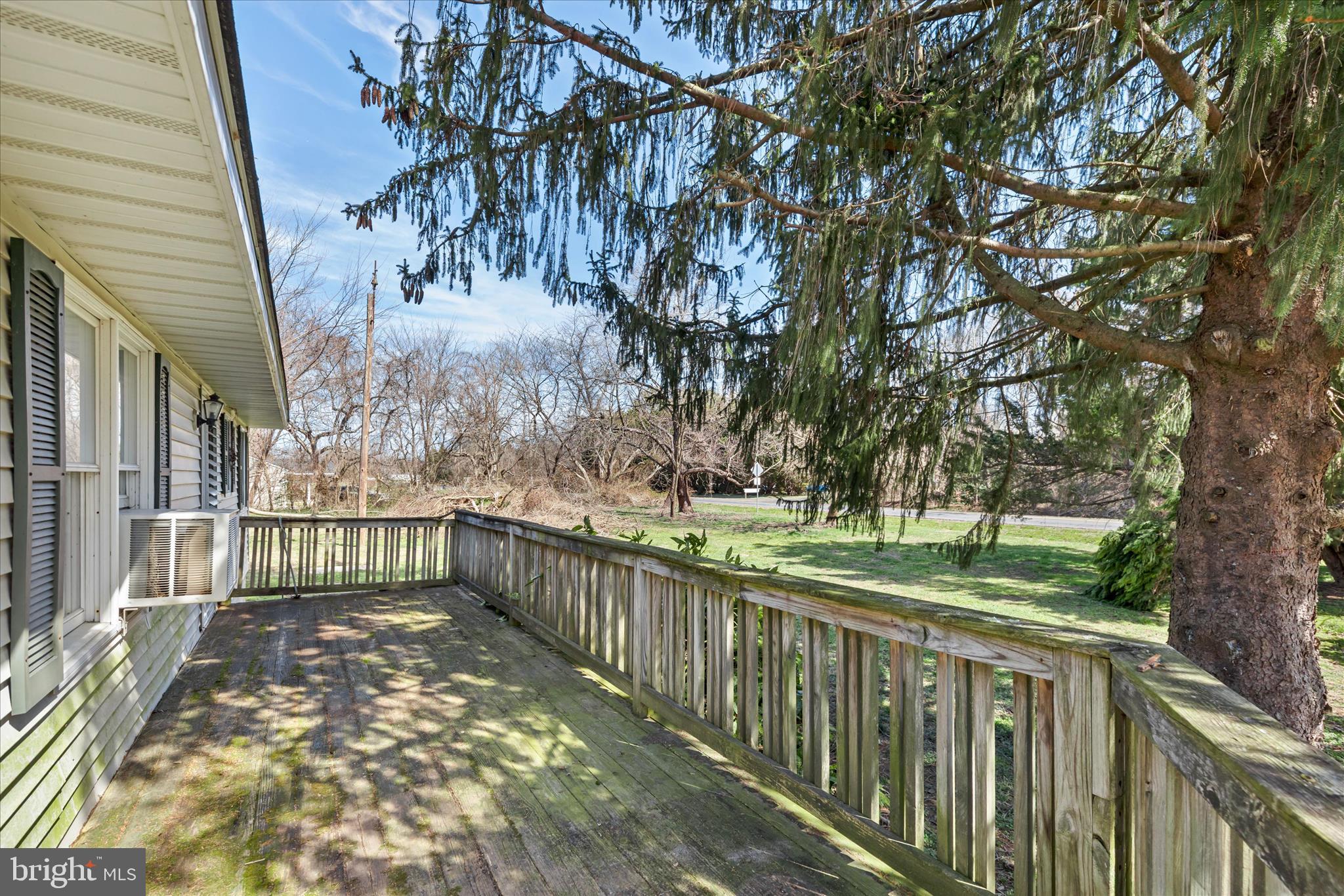 28359 Martins Farm Road Milton, DE 19968 - Photo 6 of 63 a view of balcony with wooden floor and fence