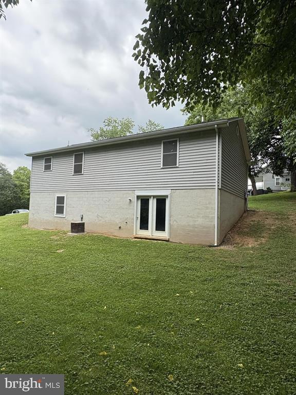 296 Bryce Boulevard Mount Jackson, VA 22842 - Photo 16 of 20 a house with huge green field in front of it