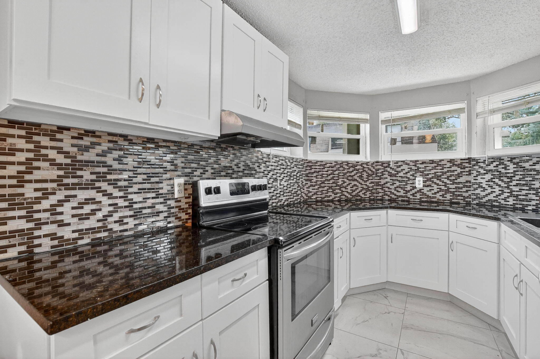 9375 Southwest 61st Way, Unit A12 Boca Raton, FL 33428 - Photo 3 of 44 10-web-or-mls-DSC_1779