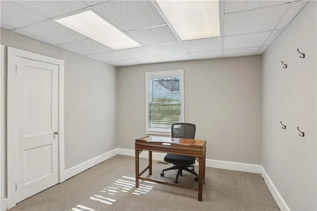 a workspace with furniture and window