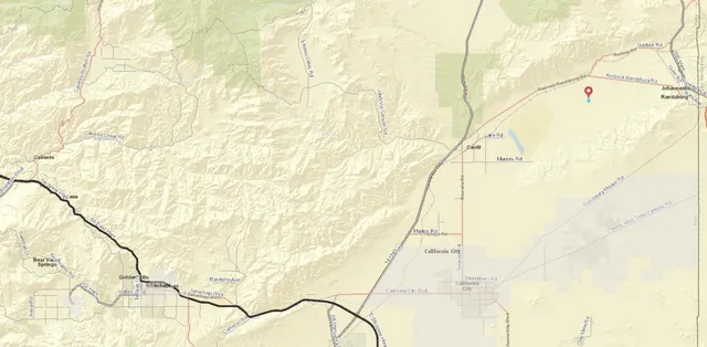 a close up of a wall with a bench