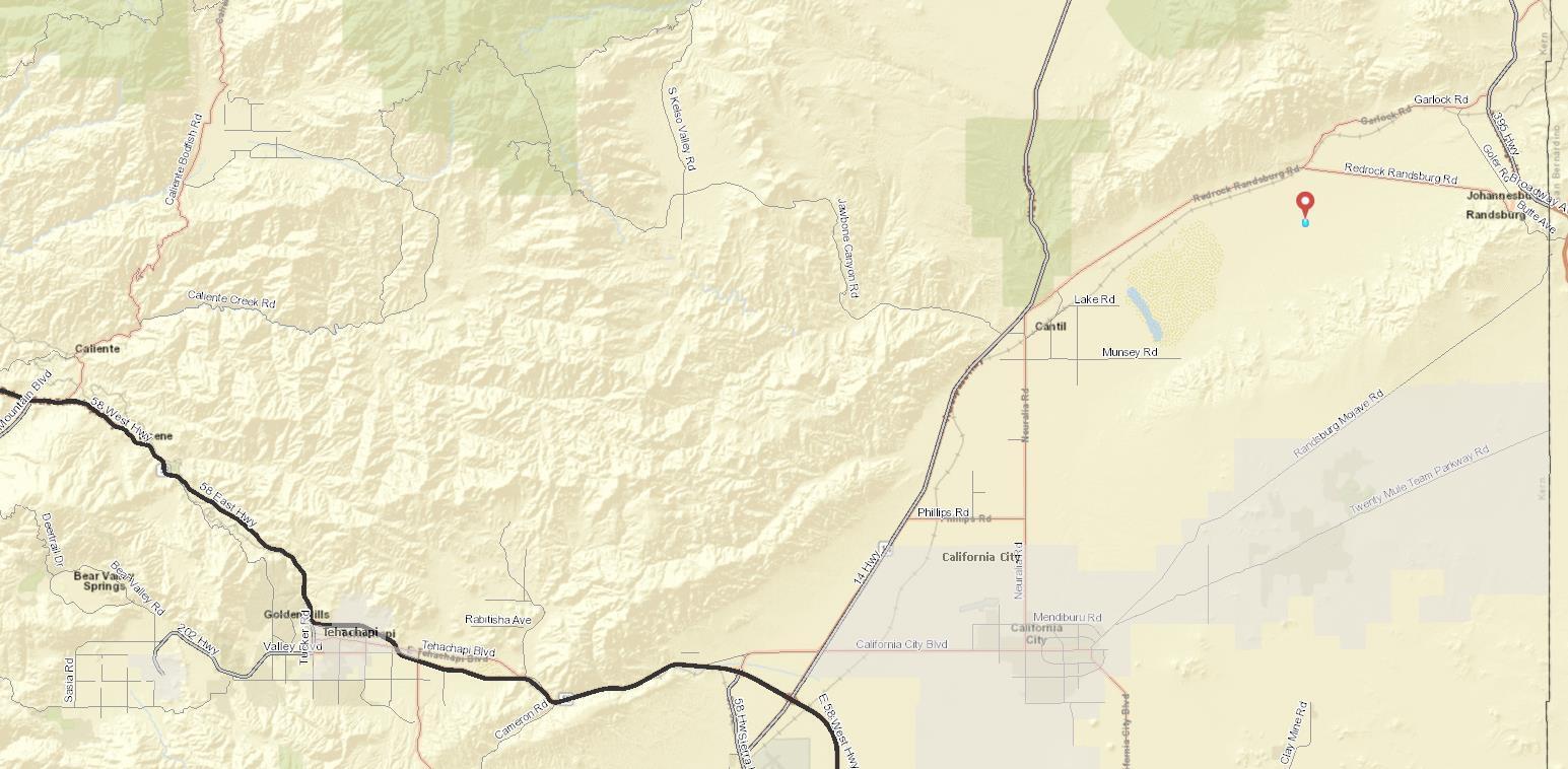 0 Butterfield Ranch Road Johannesburg, CA 93528 - Photo 8 of 9 a white house with a clock on it