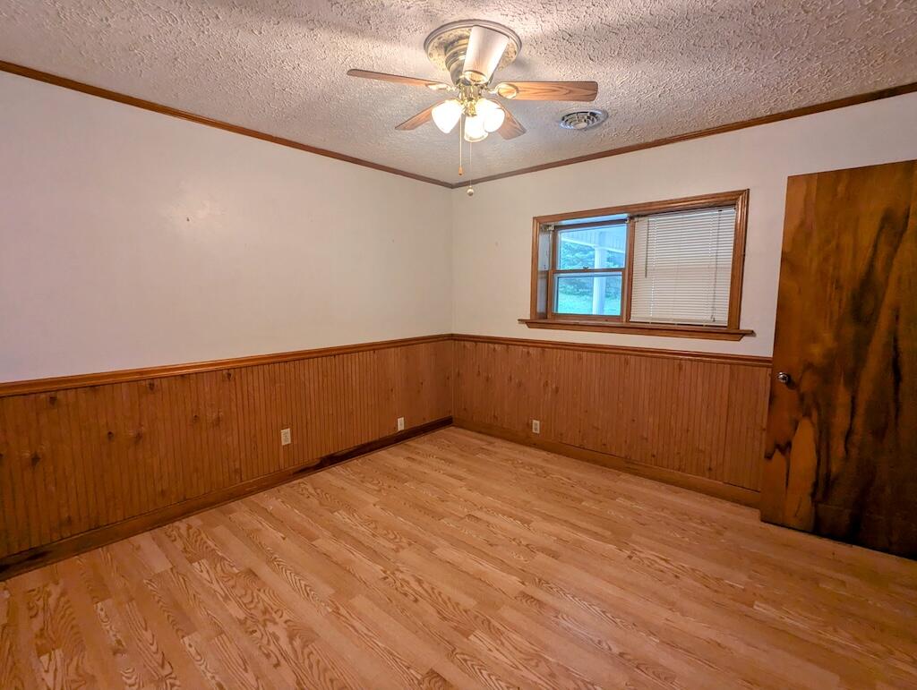 714 Glendale Road Galax, VA 24333 - Photo 17 of 26 a view of an empty room with a window
