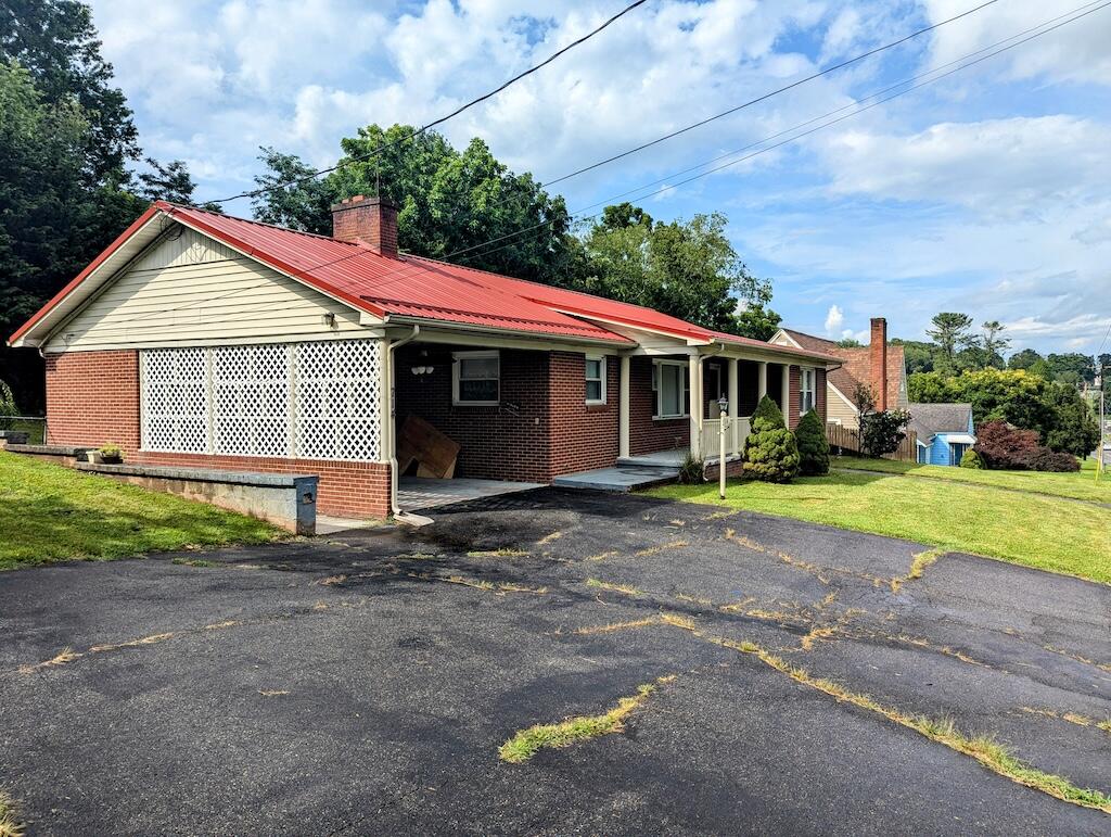 714 Glendale Road Galax, VA 24333 - Photo 2 of 26 a view of front of a house with a yard