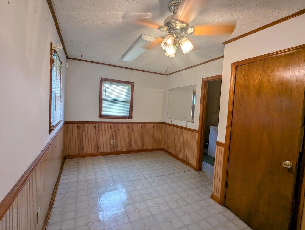 714 Glendale Road Galax, VA 24333 - Photo 21 of 26 wooden floor in an empty room with a window