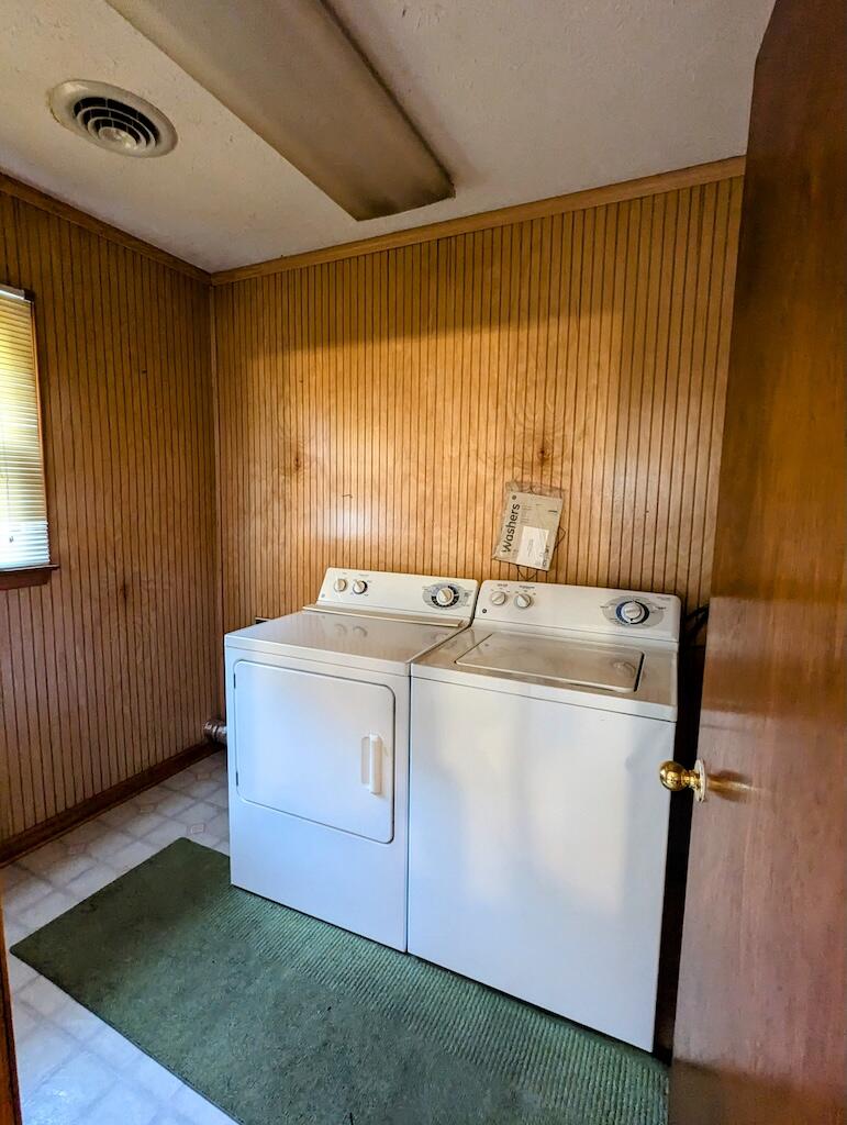 714 Glendale Road Galax, VA 24333 - Photo 22 of 26 a utility room with dryer and washer