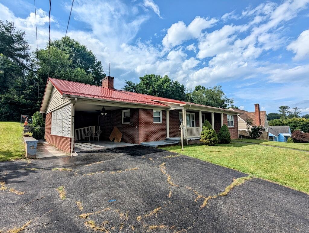 714 Glendale Road Galax, VA 24333 - Photo 3 of 26 a view of a house with a yard