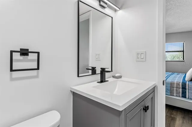 a bathroom with a sink and a toilet
