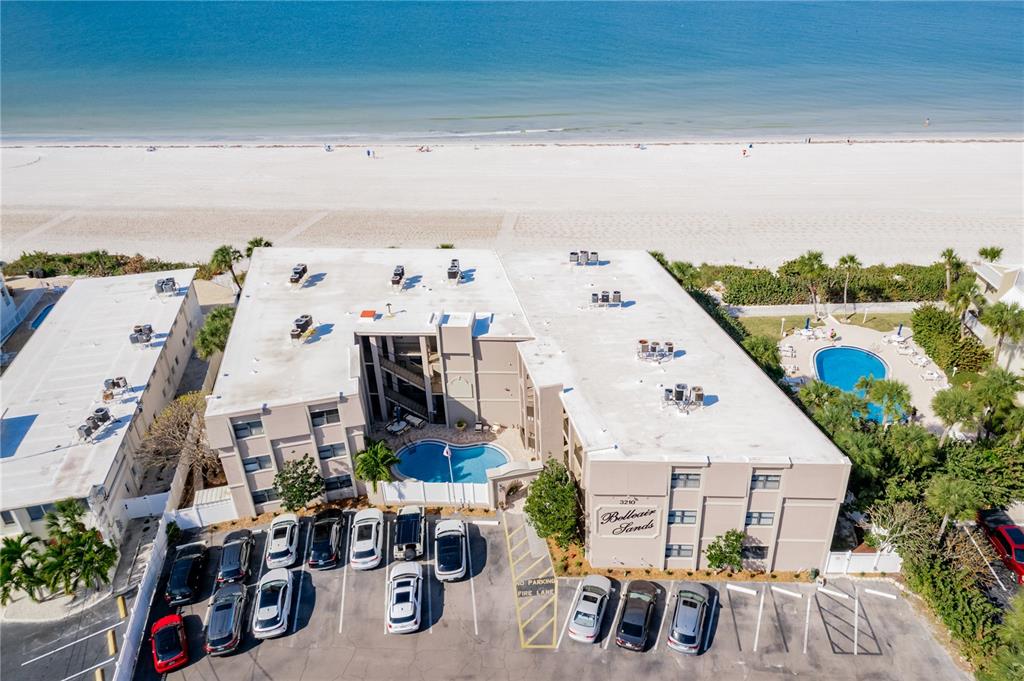 3210 Gulf Boulevard, Unit 307 Belleair Beach, FL 33786 - Photo 27 of 44 a view of roof deck with furniture and garden view