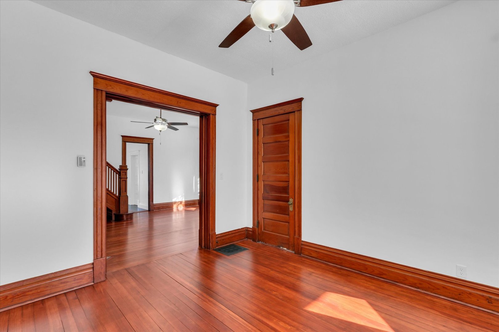 202 East Daggy Street Tuscola, IL 61953 - Photo 18 of 45 an empty room with wooden floor and closet