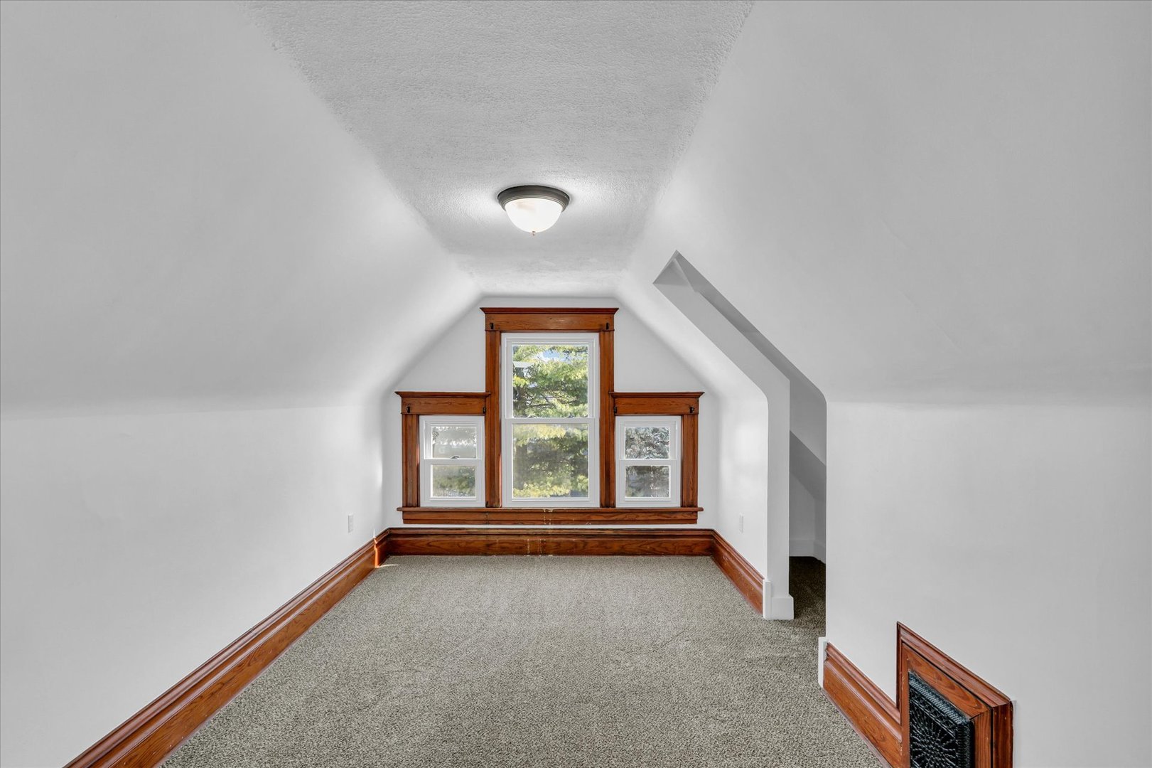 202 East Daggy Street Tuscola, IL 61953 - Photo 23 of 45 an empty room with windows