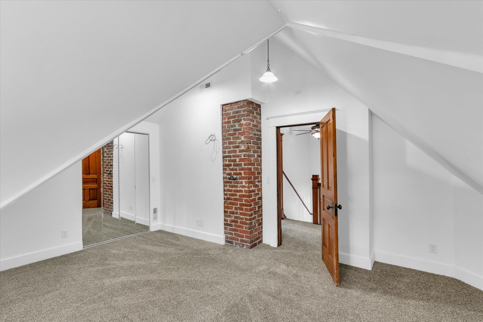 202 East Daggy Street Tuscola, IL 61953 - Photo 26 of 45 a view of an empty room and stairs