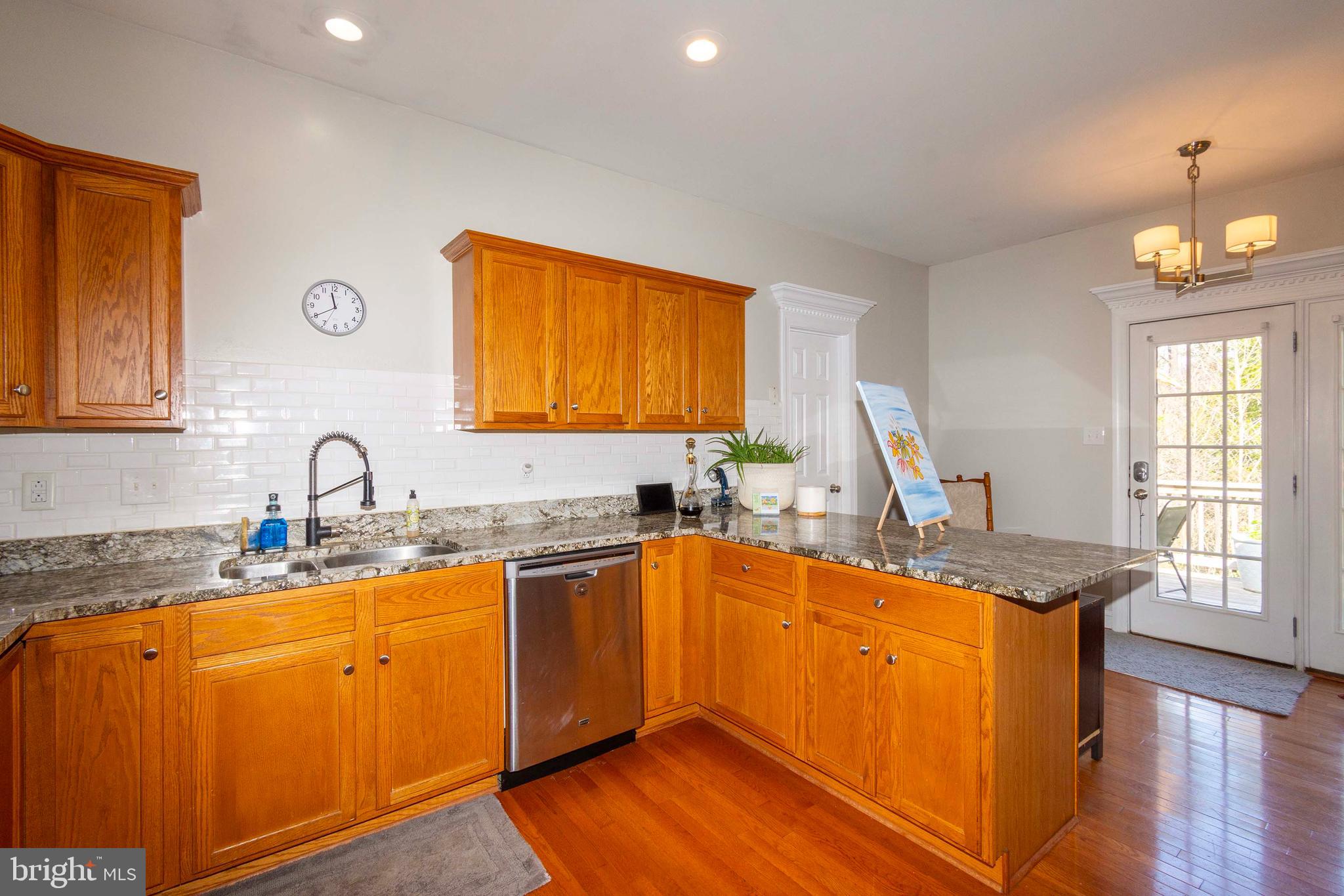 2203 Campbell Road Gordonsville, VA 22942 - Photo 11 of 53 a kitchen with granite countertop a sink cabinets and window