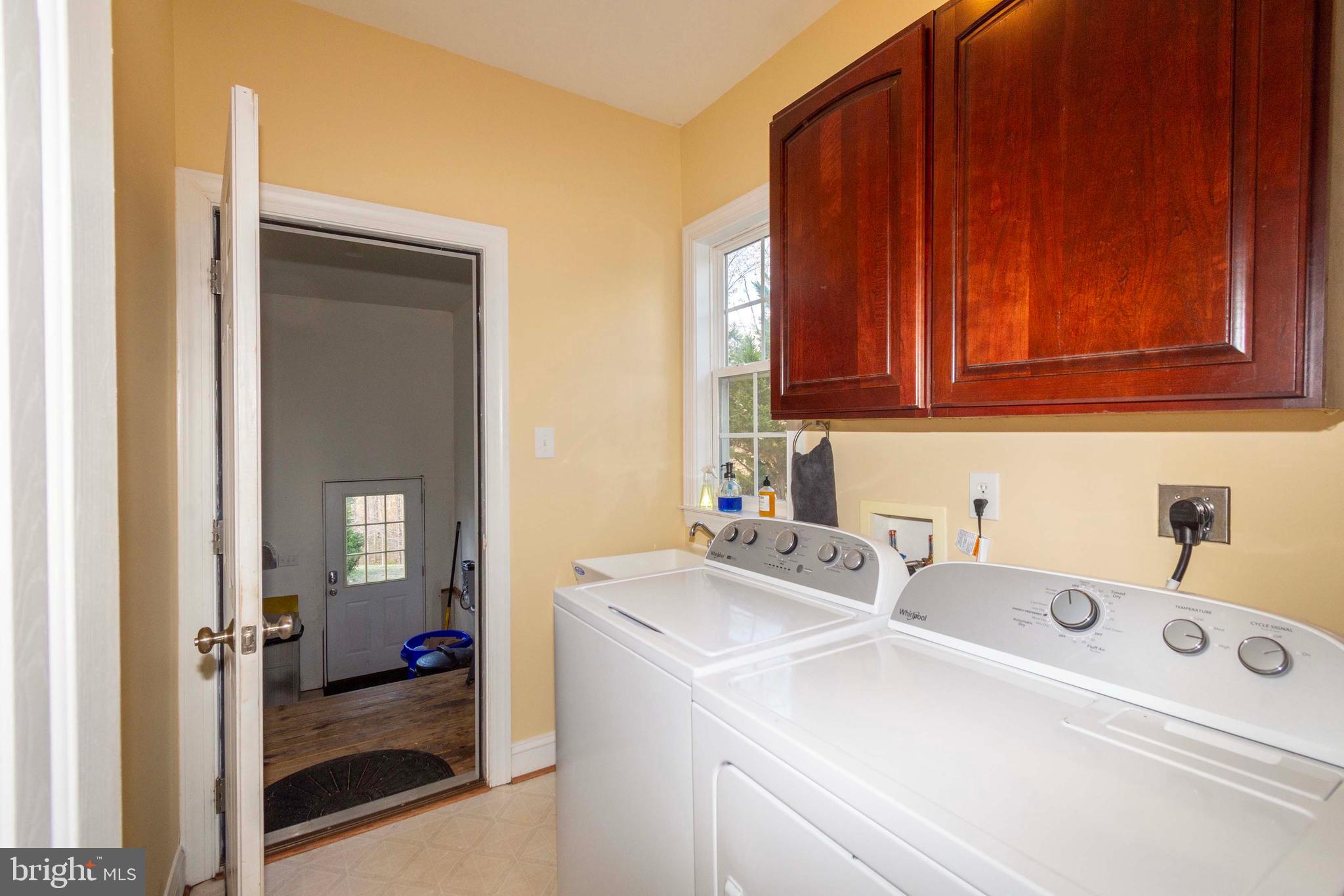2203 Campbell Road Gordonsville, VA 22942 - Photo 14 of 53 a utility room with dryer and washer