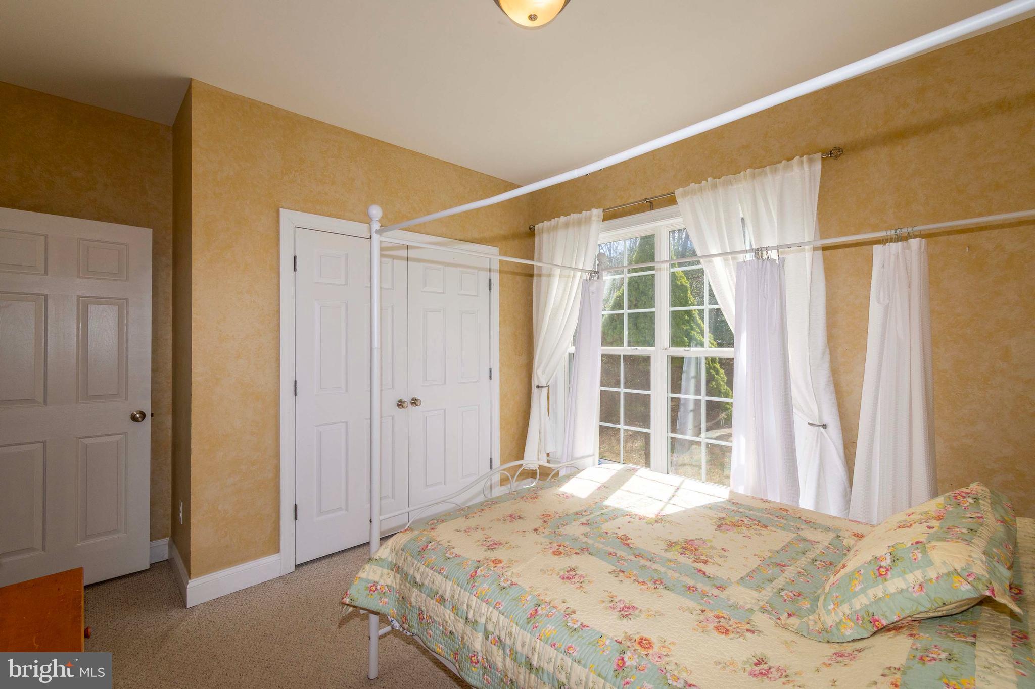 2203 Campbell Road Gordonsville, VA 22942 - Photo 21 of 53 a bedroom with a bed and a window