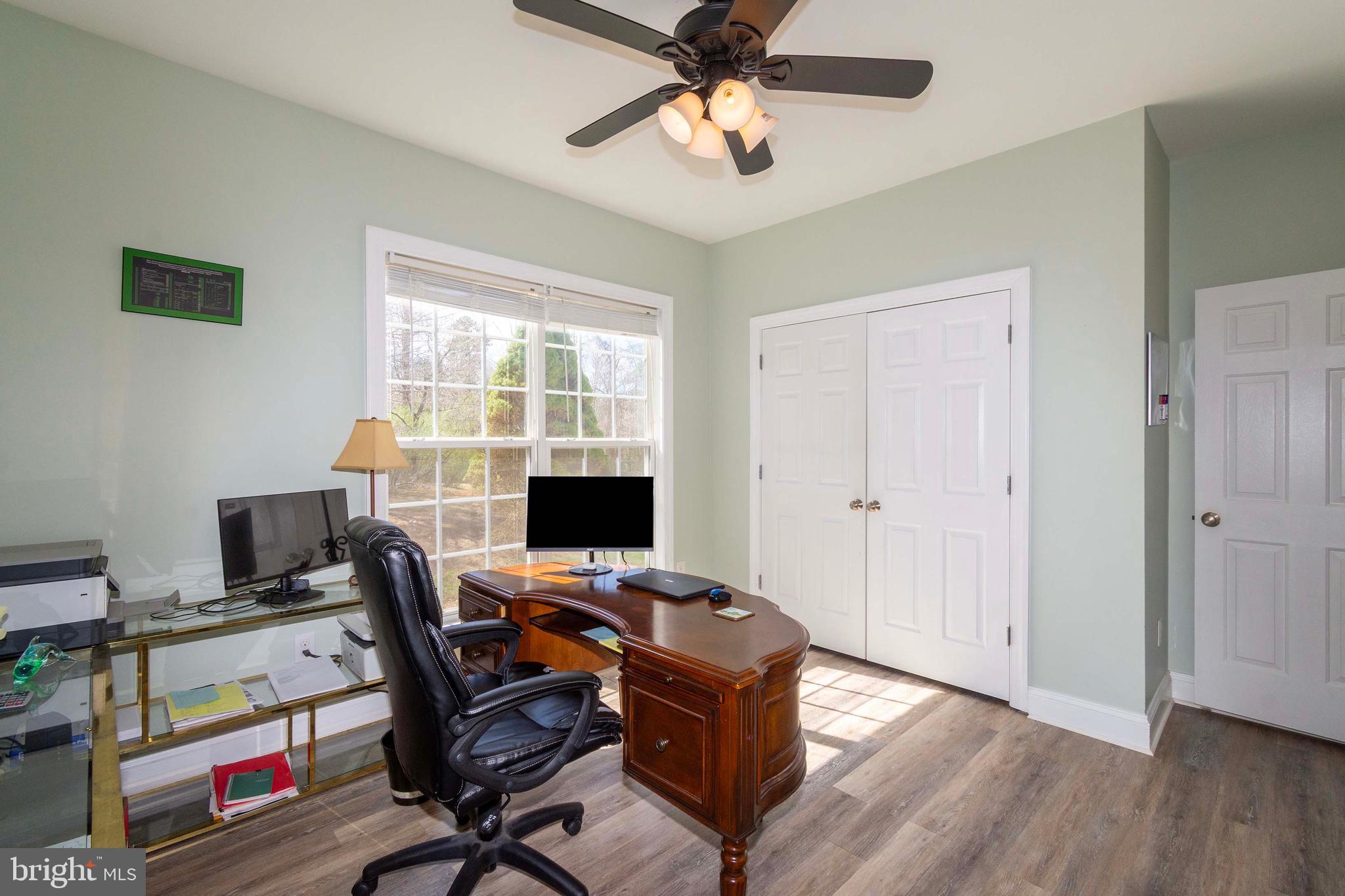 2203 Campbell Road Gordonsville, VA 22942 - Photo 24 of 53 a view of a workspace with furniture and a window
