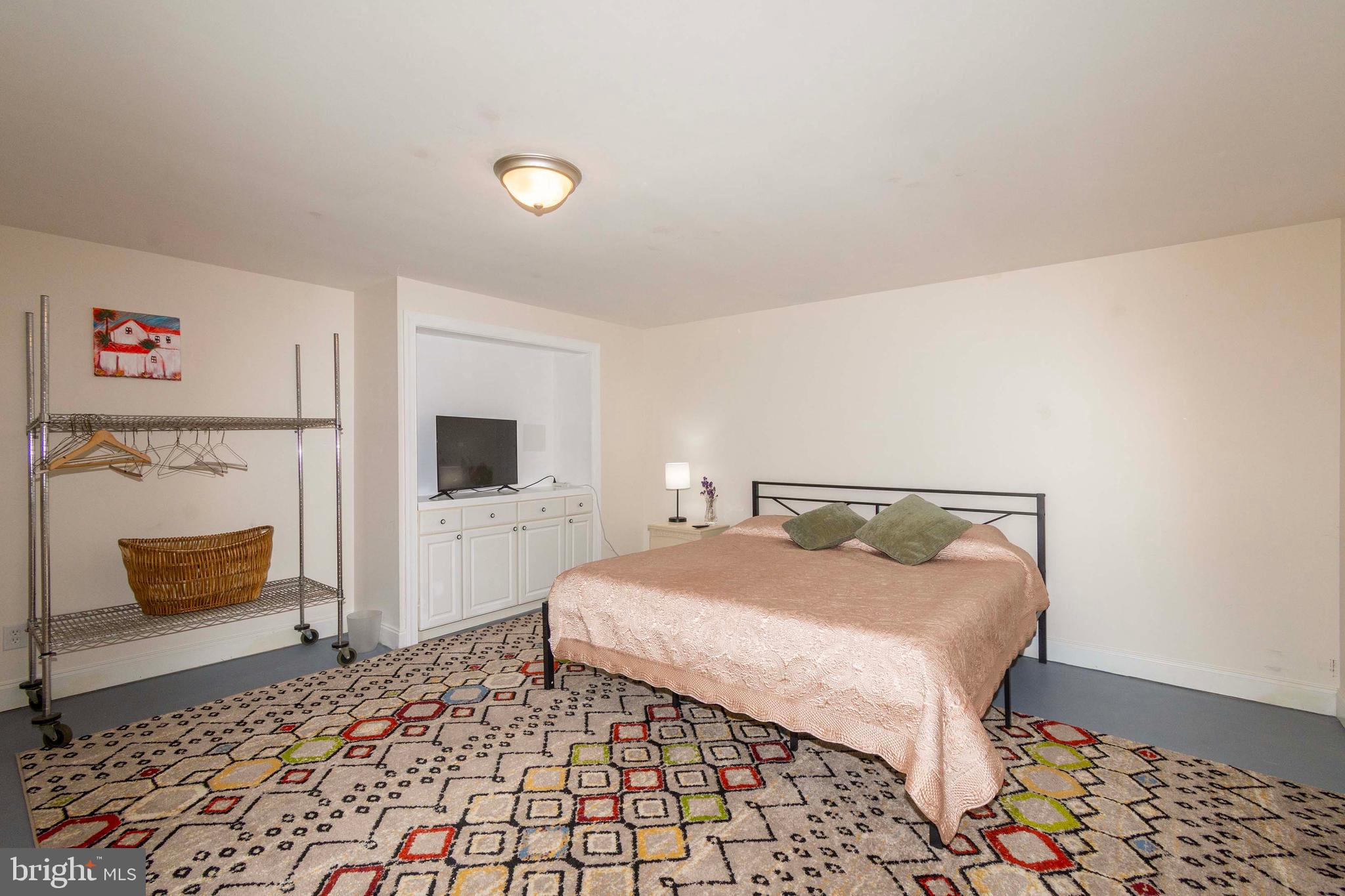 2203 Campbell Road Gordonsville, VA 22942 - Photo 27 of 53 a bedroom with a bed and a couch
