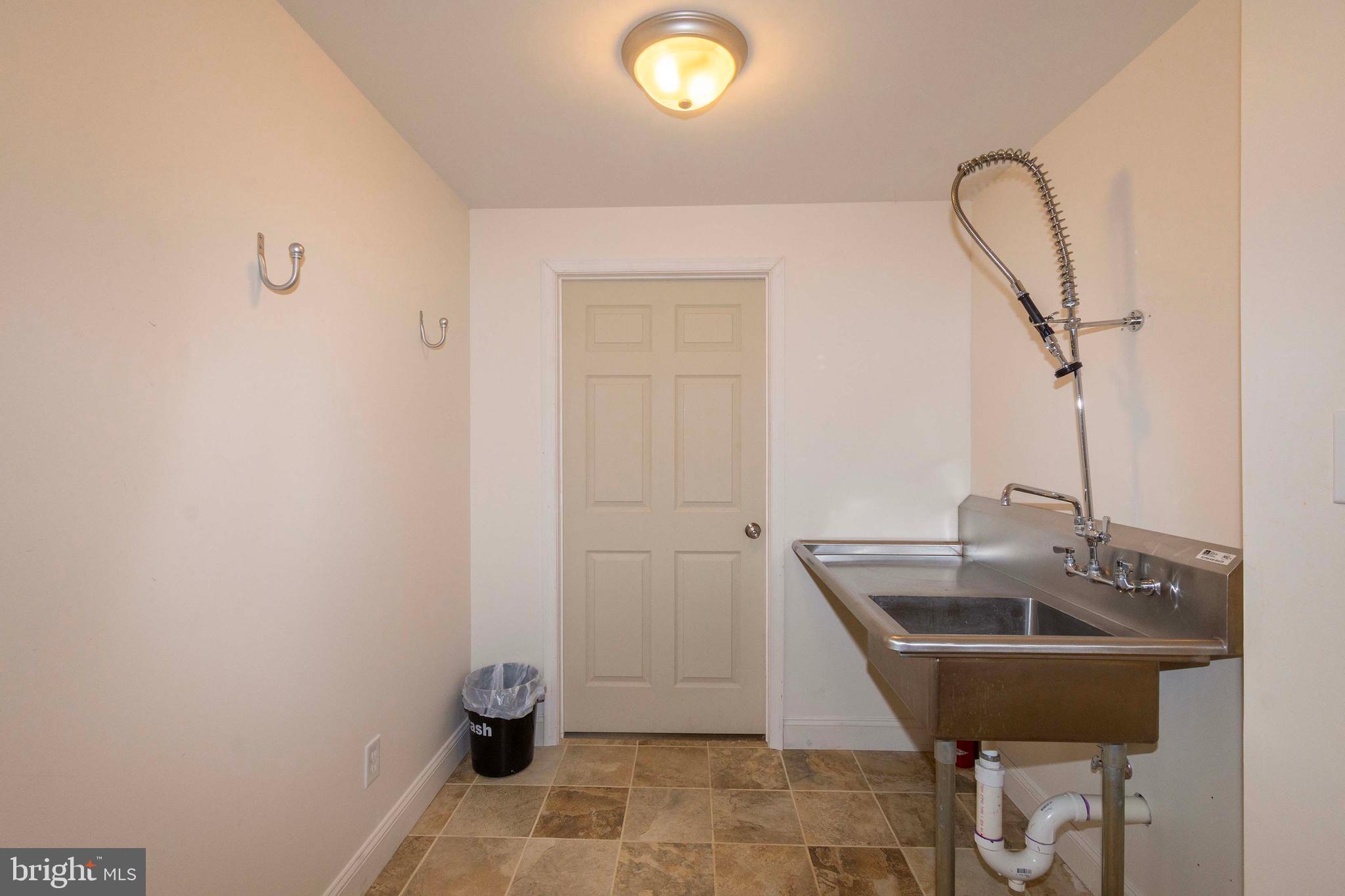 2203 Campbell Road Gordonsville, VA 22942 - Photo 28 of 53 a bathroom with a sink and a mirror