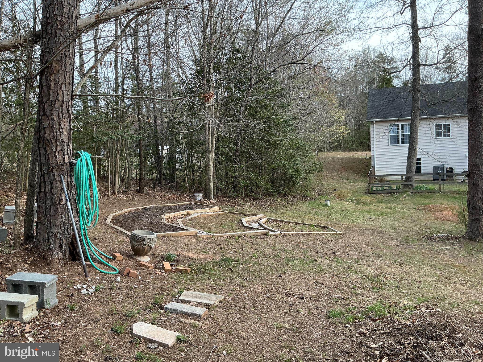 2203 Campbell Road Gordonsville, VA 22942 - Photo 39 of 53 a backyard of a house with lots of green space