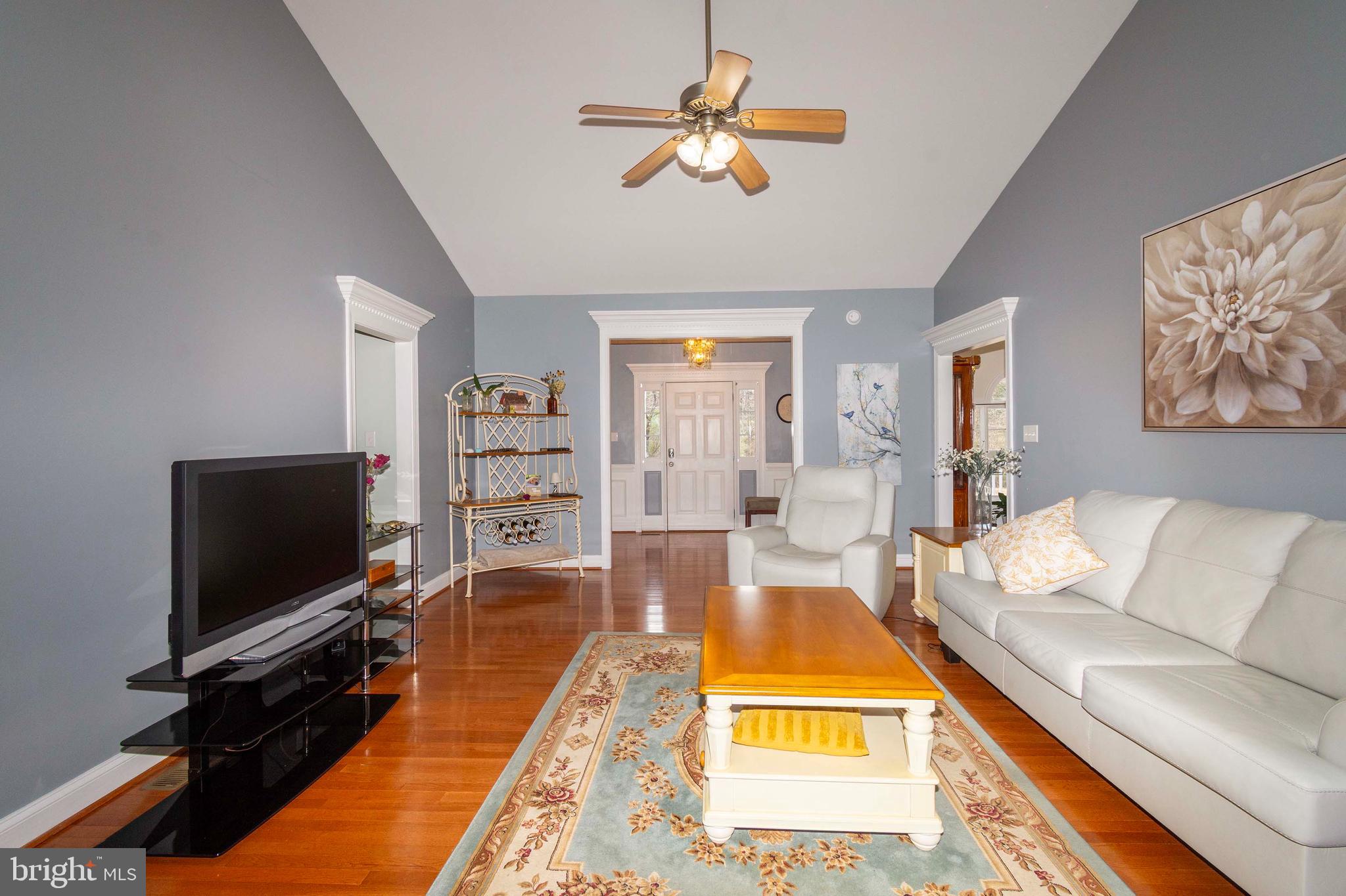 2203 Campbell Road Gordonsville, VA 22942 - Photo 5 of 53 a living room with furniture and a flat screen tv