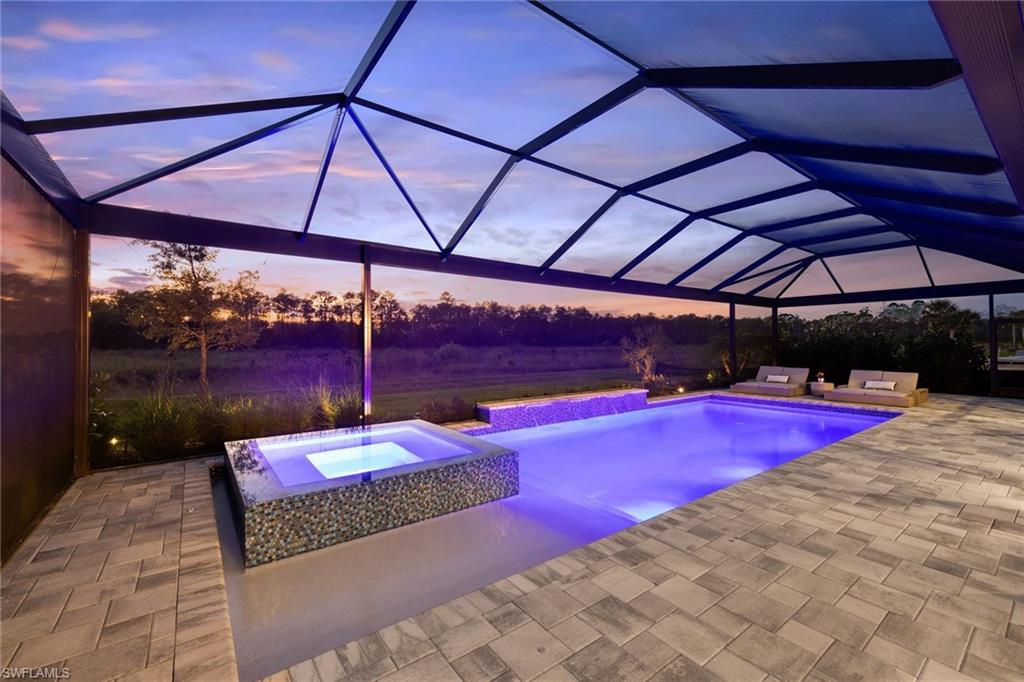 19134 Elston Way Estero, FL 33928 - Photo 1 of 35 a outdoor space with pool and table