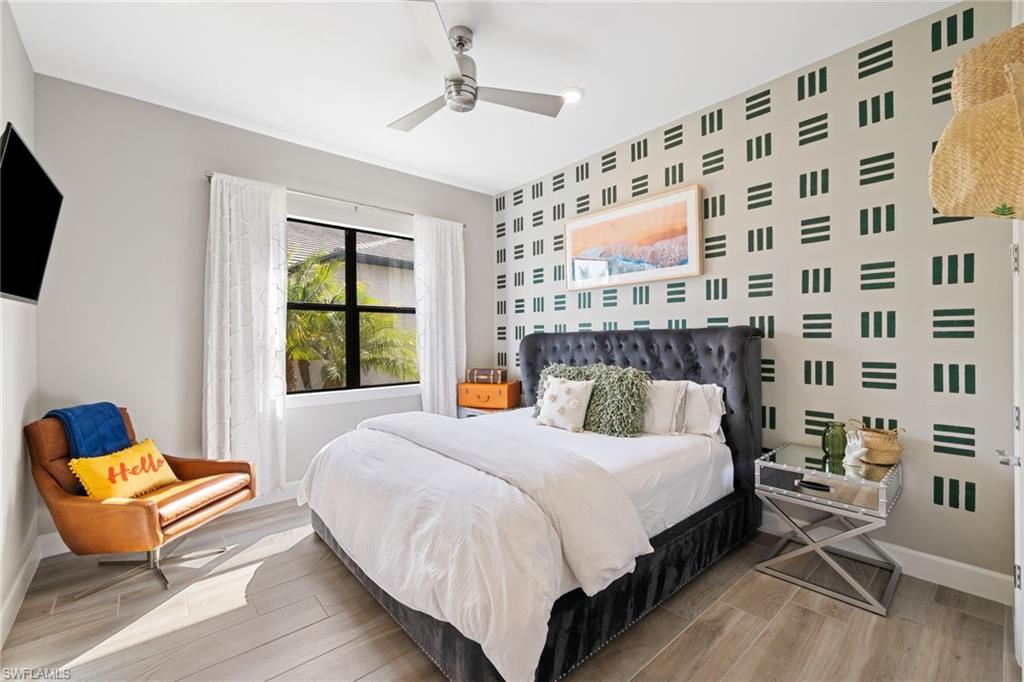 19134 Elston Way Estero, FL 33928 - Photo 28 of 35 a bedroom with a bed and window