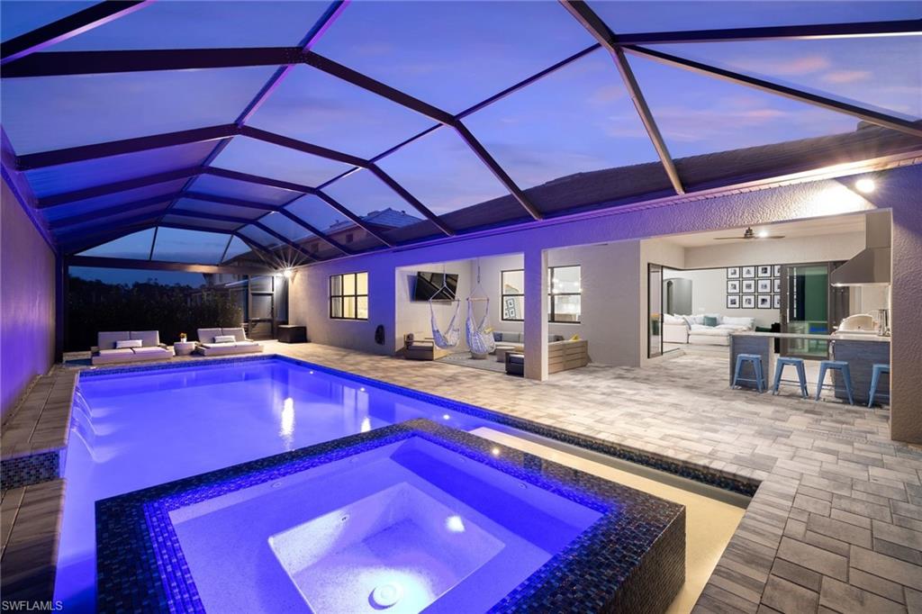 19134 Elston Way Estero, FL 33928 - Photo 4 of 35 a room with pool table and chairs