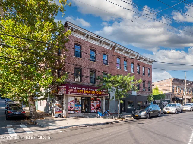 a building with trees in front of it