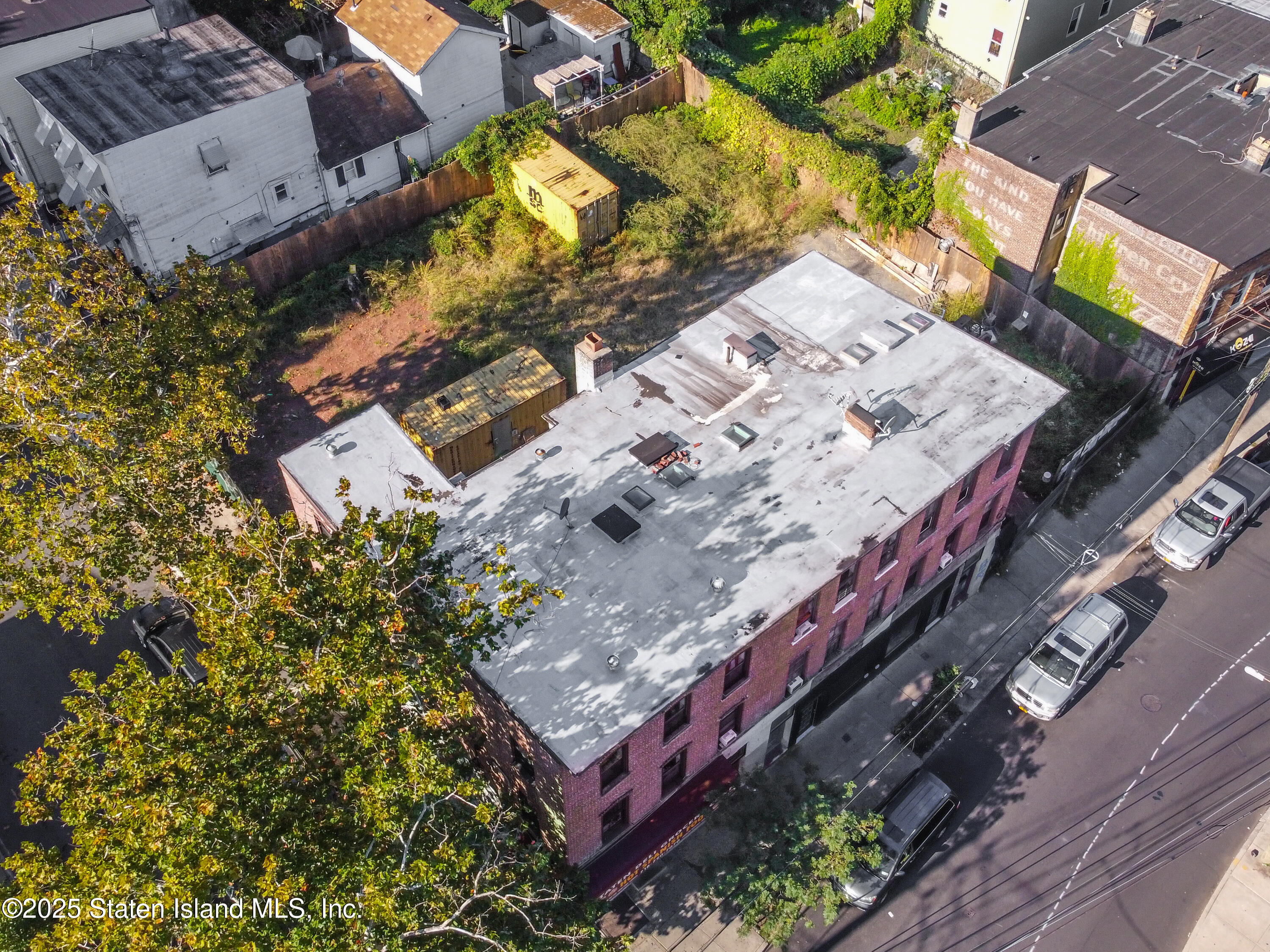 Undisclosed Address Staten Island, NY 10301 - Photo 5 of 7 an aerial view of a house