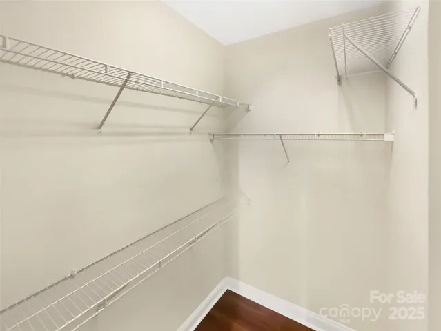 a view of a room with racks on the wall