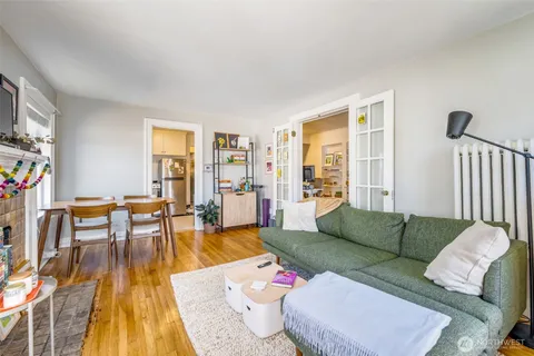 a living room with furniture and a table