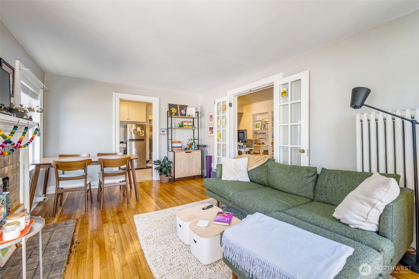 746 10th Avenue East Seattle, WA 98102 - Photo 12 of 34 a living room with furniture and a table